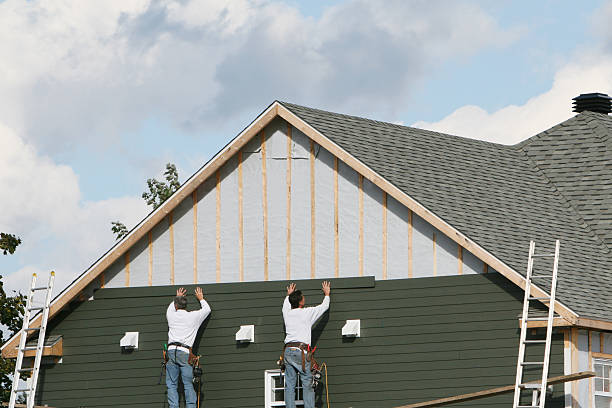 Professional Siding technician working in Manitou Springs, CO